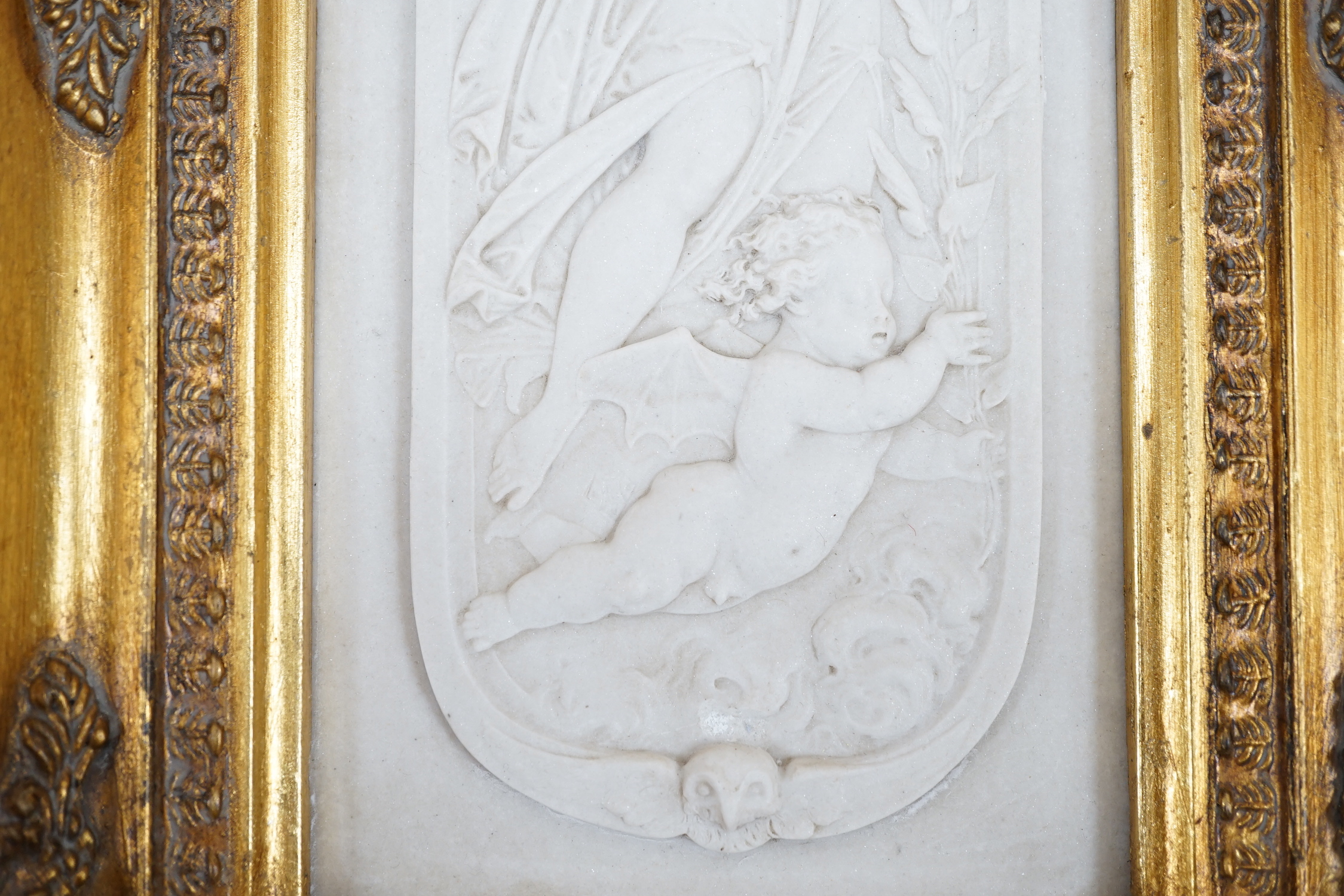 An ornate framed reconstituted stone frieze, 42 x 23cm